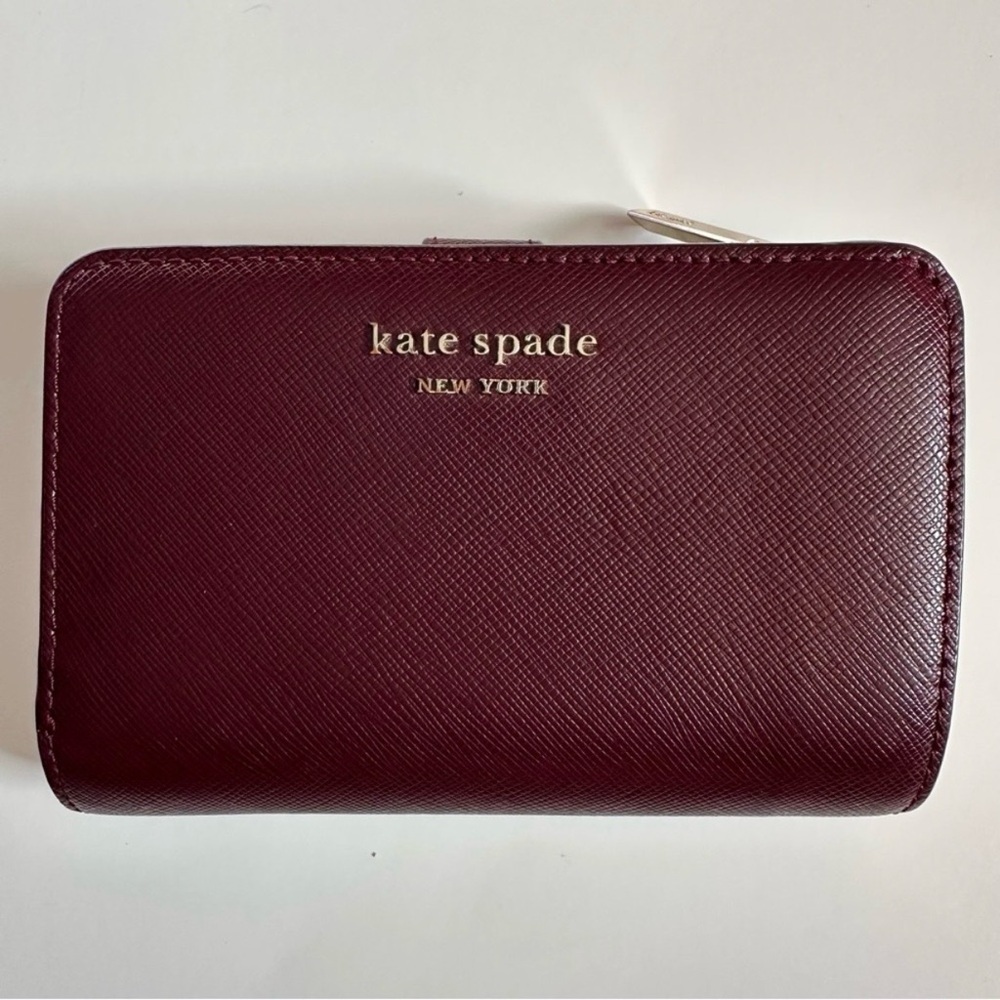 Kate Spade Burgundy Zip-Around Wallet with Gold Logo